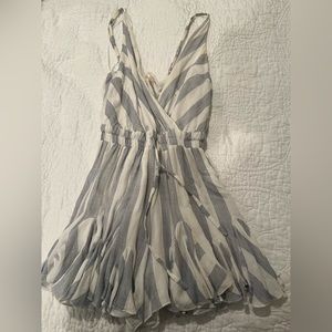 Blue and white striped flowy romper